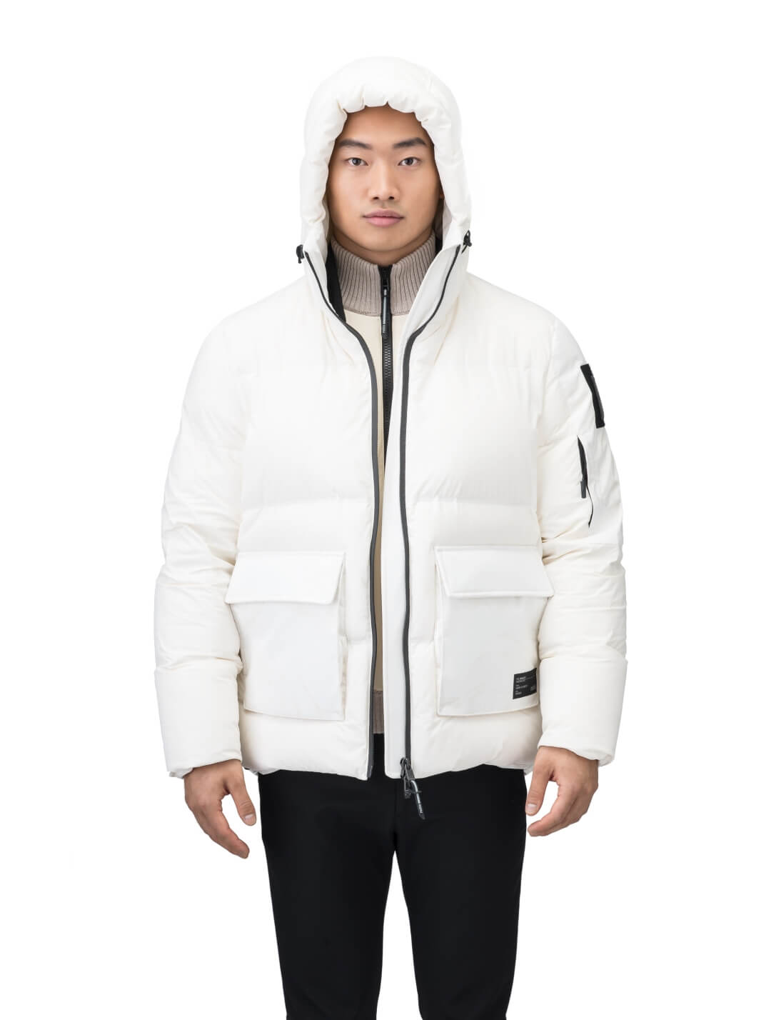 Supra Men's Performance Puffer in hip length, Technical Taffeta and 3-Ply Micro Denier fabrication, Premium Canadian White Duck Down insulation, non-removable down filled hood, centre front two-way zipper, flap pockets at waist, and zipper pocket at left bicep, in Wheat Desert