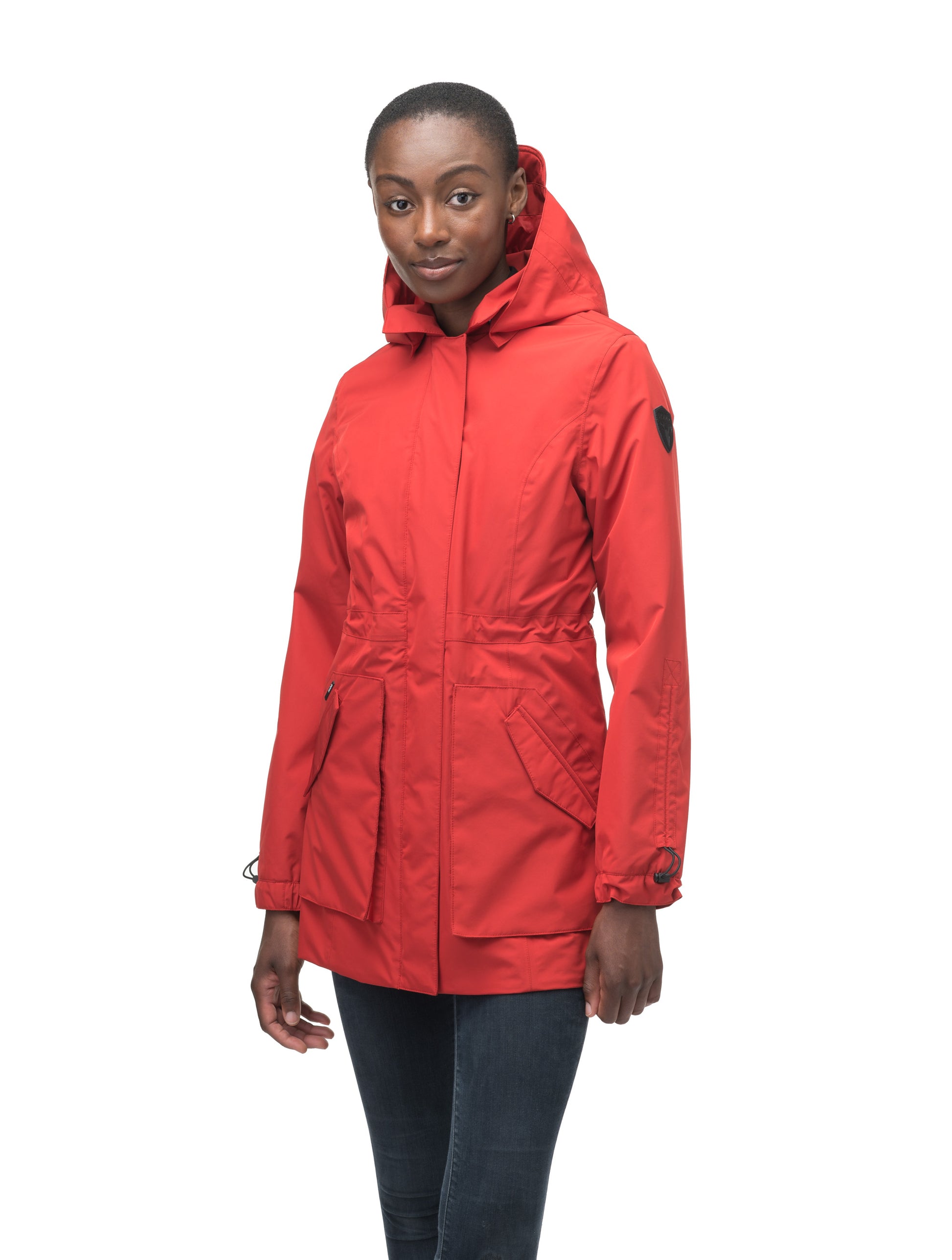 Women's thigh length raincoat with collar and non-removable hood in Vermillion