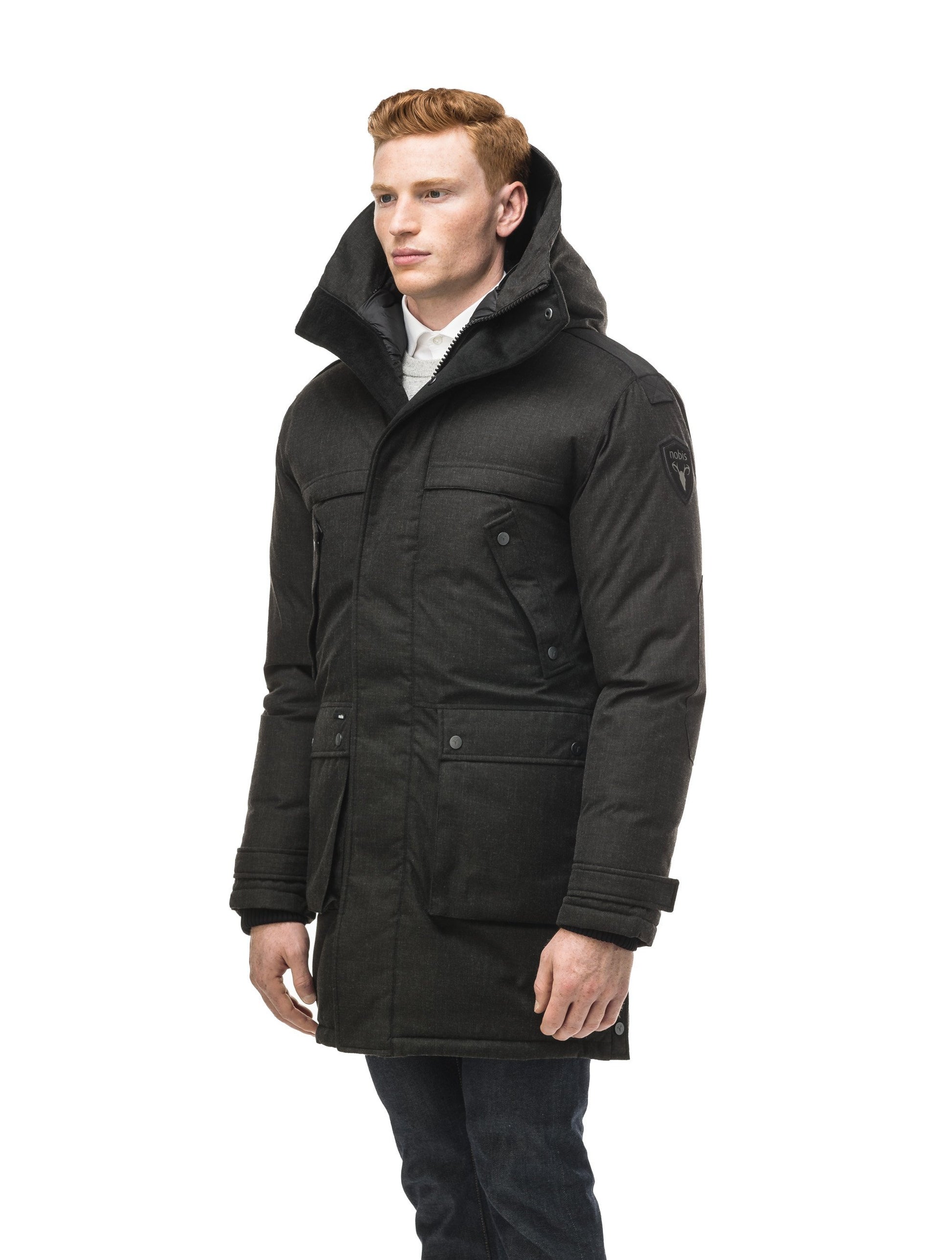 Men's Best Selling Parka the Yatesy is a down filled jacket with a zipper closure and magnetic placket in H. Black