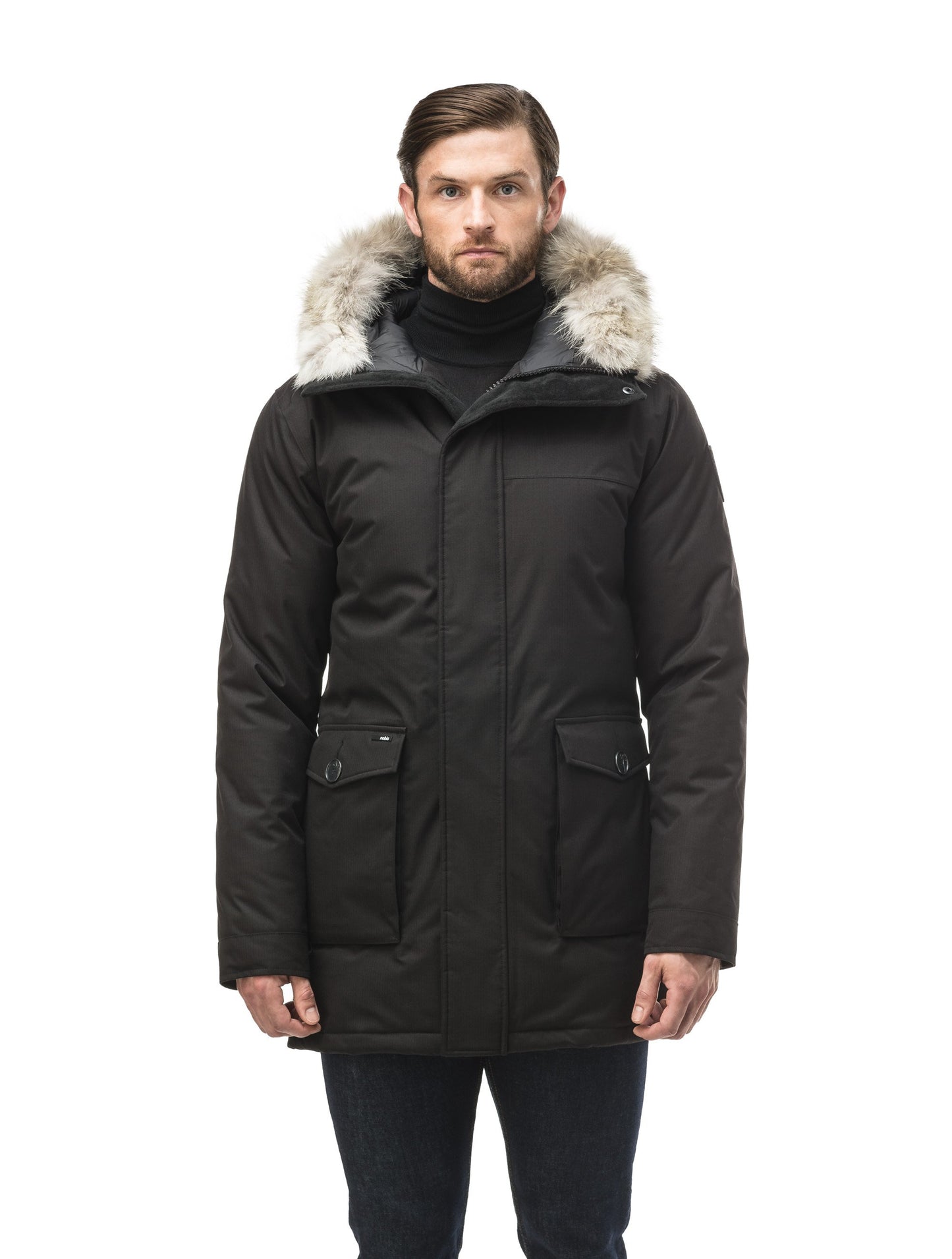 Men's slim fitting waist length parka with removable fur trim on the hood and two waist patch pockets in CH Black