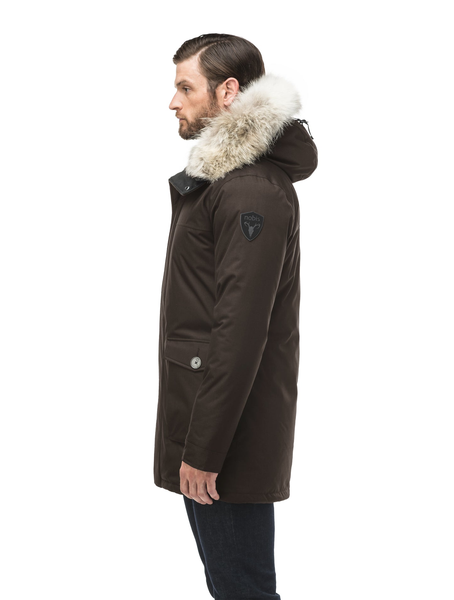 Men's slim fitting waist length parka with removable fur trim on the hood and two waist patch pockets in CH Brown