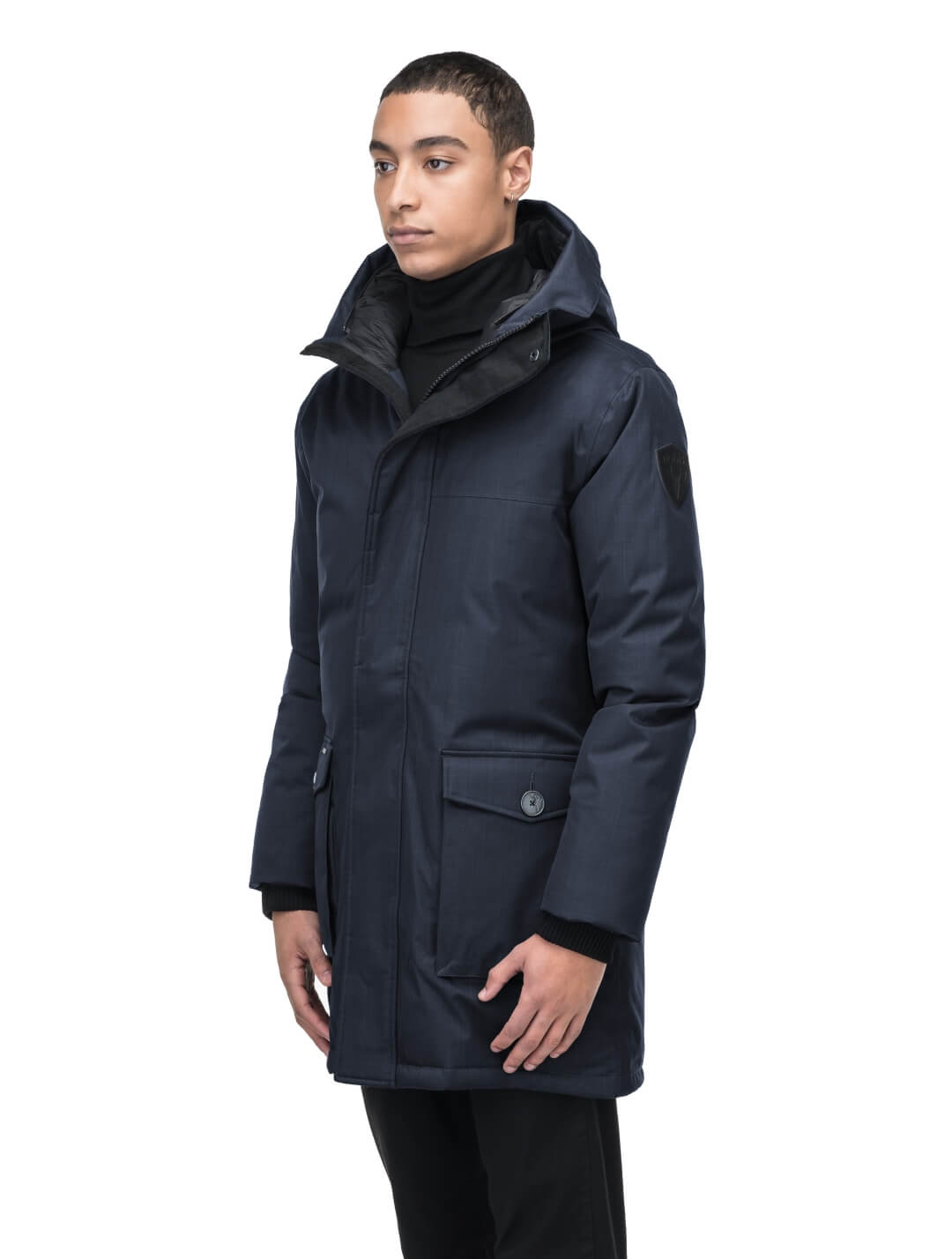 Men's slim fitting waist length parka with removable fur trim on the hood and two waist patch pockets in CH Navy